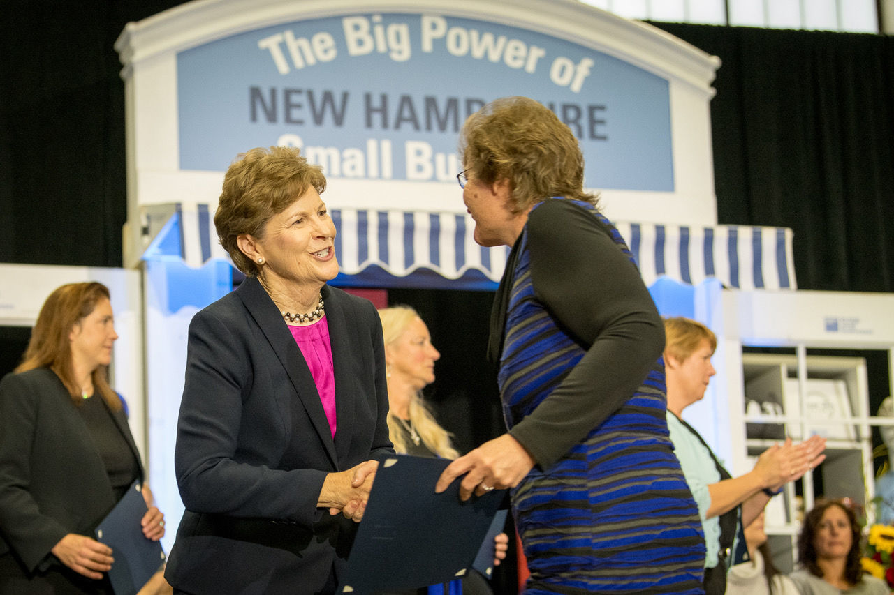U.S. Sen. Jeanne Shaheen, D-NH, congratulates a small business owner